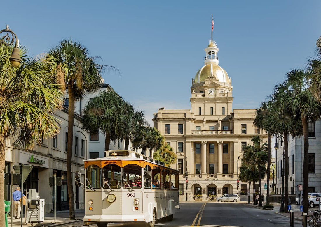 Old Savannah Trolley passing by Savannah City Hall