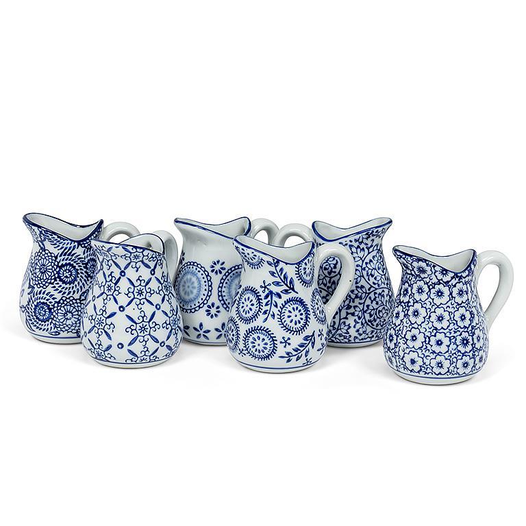 sm blue and white assorted handled jug