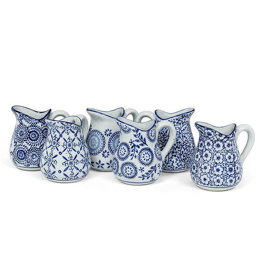sm blue and white assorted handled jug