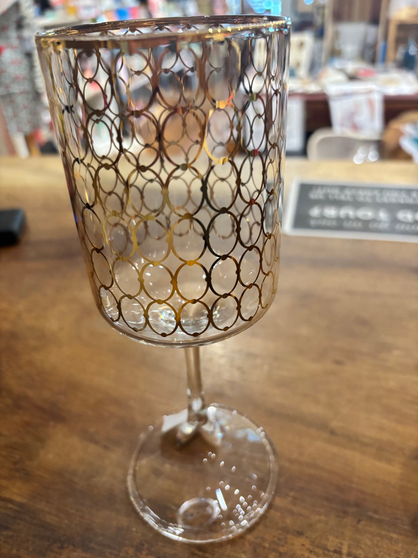 Slender wine glass with gold rings